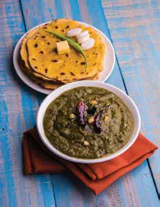 Makki di roti with a bowl of sarson da saag