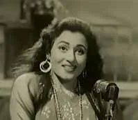 A black-and-white film still of a woman in hoop earrings at a microphone