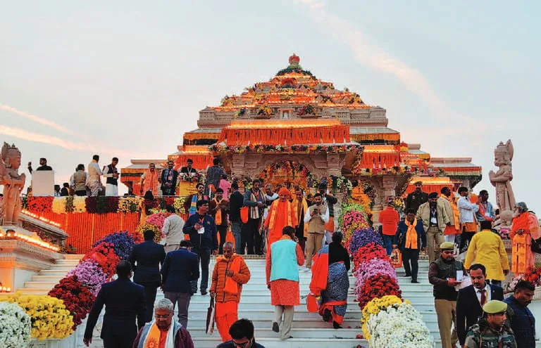 Crowds at a temple decorated for a festival