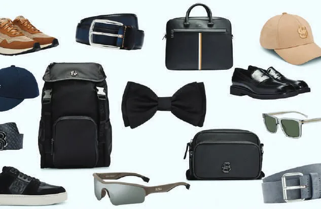 Men’s accessories laid out: bags, belts, shoes and sunglasses