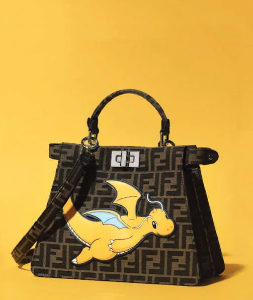 A black handbag with a cartoon character
