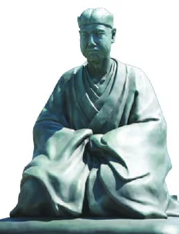 A statue of a seated Japanese poet
