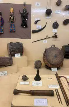 Musical instruments and artefacts in a museum display