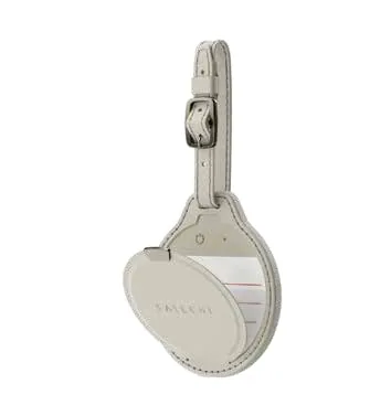 A vegan-leather luggage tag with a tracker
