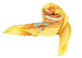 A yellow and orange printed silk scarf