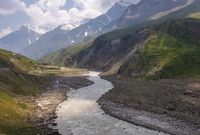 A river winding through a broad mountain valley