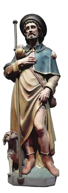 A statue of Saint Roch with a dog