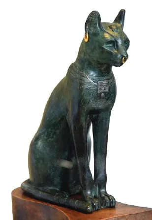 An ancient Egyptian bronze statue of a cat