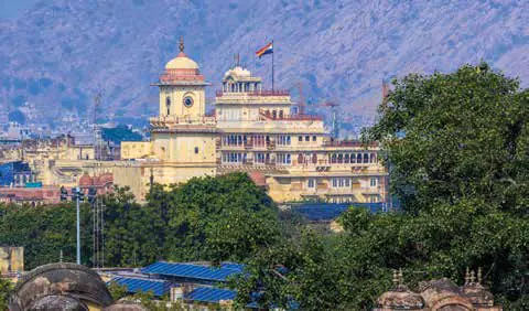 A palace with domed pavilions above the old city