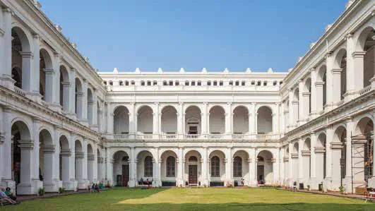The colonnaded courtyard of a grand colonial building