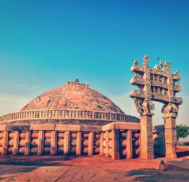 The Great Stupa at Sanchi beside a carved gateway