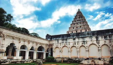 A palace courtyard with a tiered tower