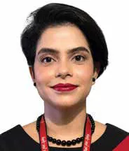 Portrait of a woman in a black top with a red lanyard