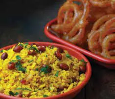 Bowls of poha and jalebi