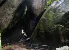 The dark entrance of a rock cave