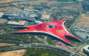 An aerial view of a red-roofed theme park