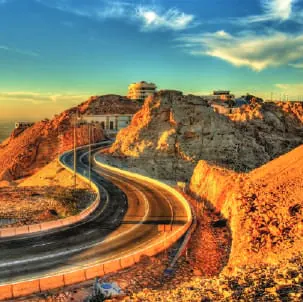 A road winding over a rocky mountain