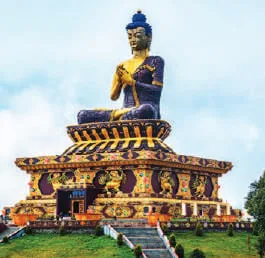 A tall statue of the Buddha on a monastery