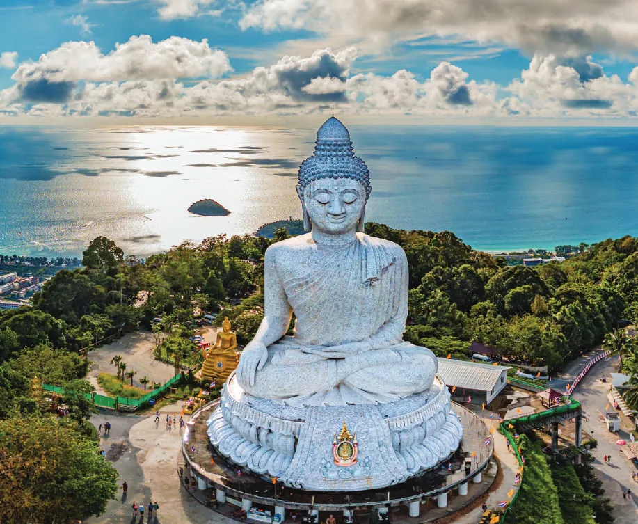 The Big Buddha statue on a hilltop overlooking the sea