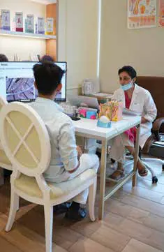 A man in consultation with a dermatologist at a clinic
