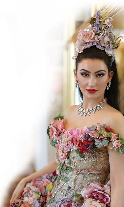 Shalini Passi in a floral headdress and a gown covered in flowers