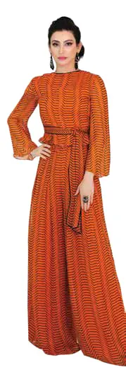 Shalini Passi in an orange jumpsuit
