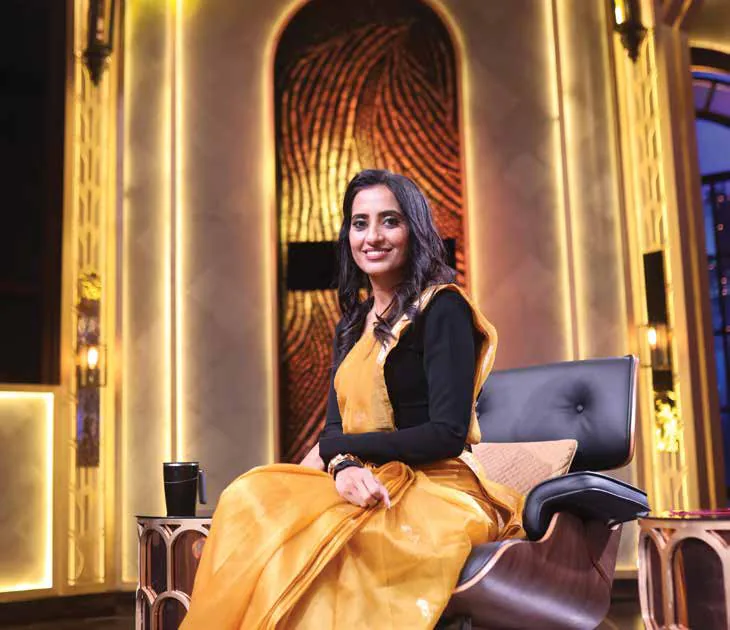 Vineeta Singh seated in an ornate chair