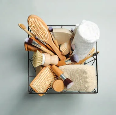 Bamboo toothbrushes and toiletries in a basket