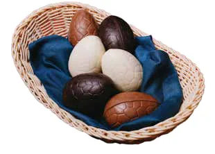 Chocolate eggs in a woven basket