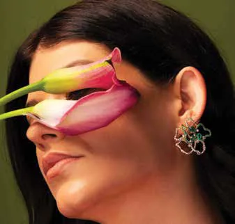 A woman with a sculptural pink earring