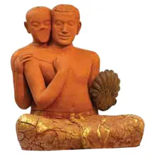 A terracotta sculpture of two embracing figures