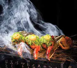 A grilled dish with smoke rising from it