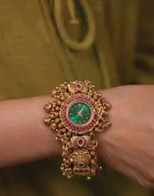 A jewelled watch worn on a wrist