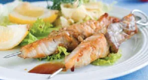 A plate of prawns with lemon